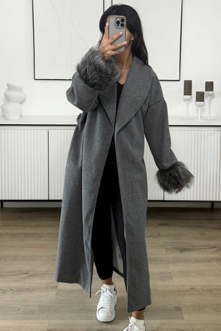 Manteau manches fourrure long