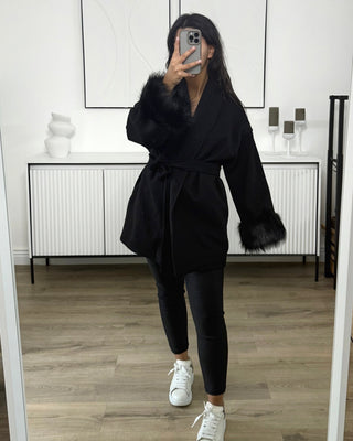 Manteau manches fourrure
