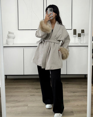 Manteau manches fourrure
