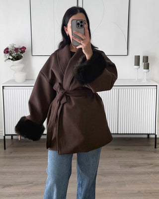 Manteau manches fourrure