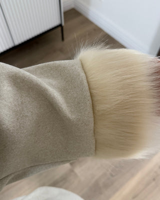 Manteau manches fourrure
